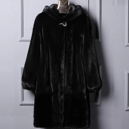 Woman wearing a long black faux fur hooded coat in a street fashion style.