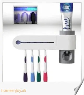 A wall-mounted 2-in-1 UV disinfection toothbrush holder with an automatic toothpaste dispenser, featuring a sleek white design and accommodating up to 5 toothbrushes.