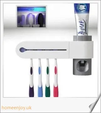 A wall-mounted 2-in-1 UV disinfection toothbrush holder with an automatic toothpaste dispenser, featuring a sleek white design and accommodating up to 5 toothbrushes.