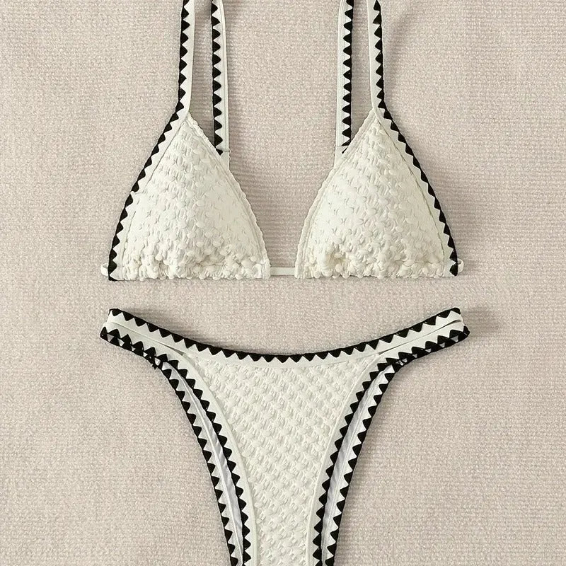Women's blue or white two-piece bikini swimsuit with briefs style.