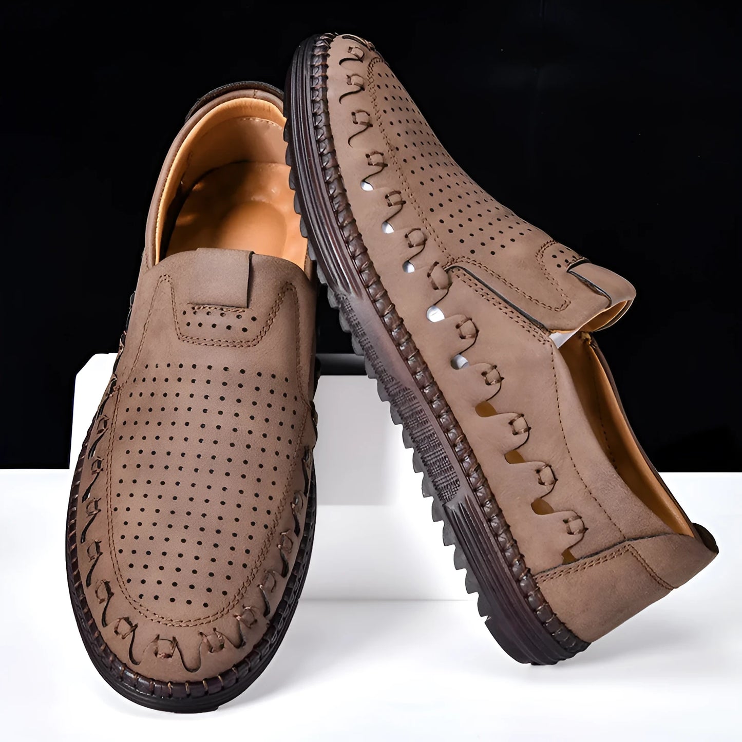 Men's brown slip-on casual shoes with round toe and visible sewing line details