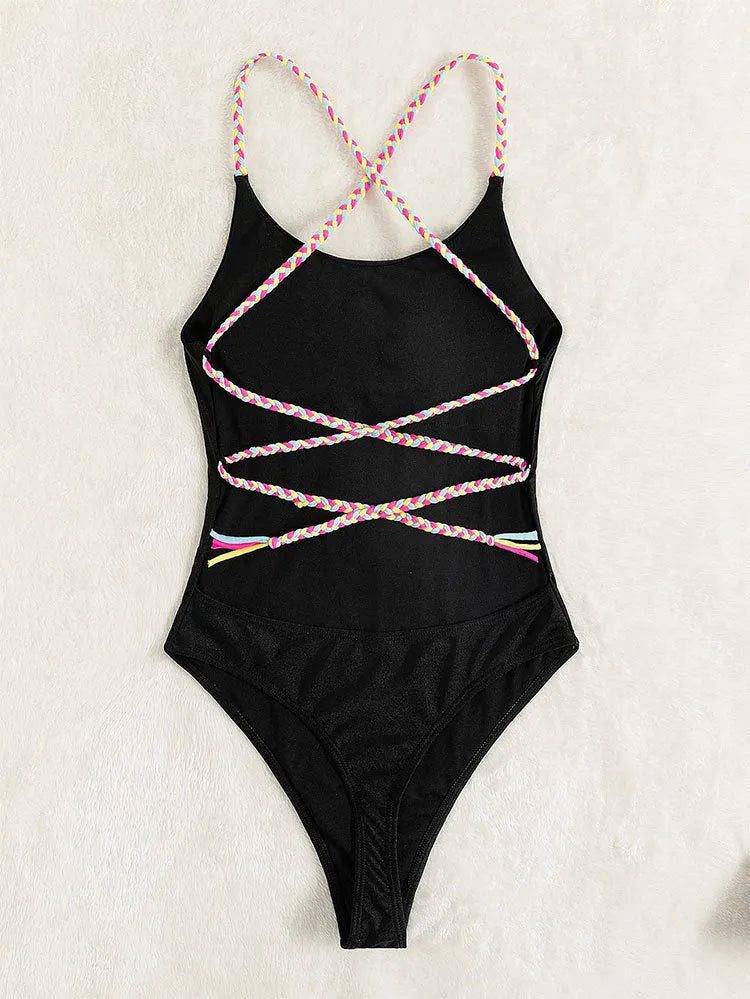 Black solid colour one-piece swimsuit with backless design and tight fit