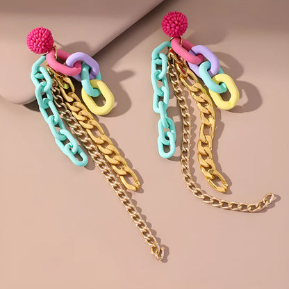 Handmade bohemian shell tassel earrings for women with colourful flower and geometric drop design