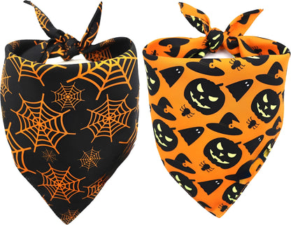 Black and orange reversible Halloween dog bandana with pumpkin and spider web patterns, adjustable for necks up to 16 inches