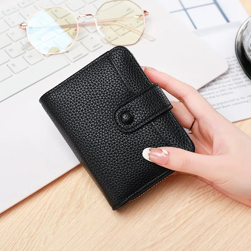 Ladies short wallet with lychee pattern texture in two-fold bifold design