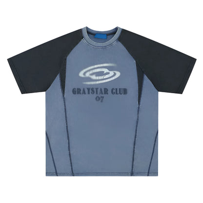 A blue men's hip hop letter print T-shirt with raglan sleeves on a hanger.