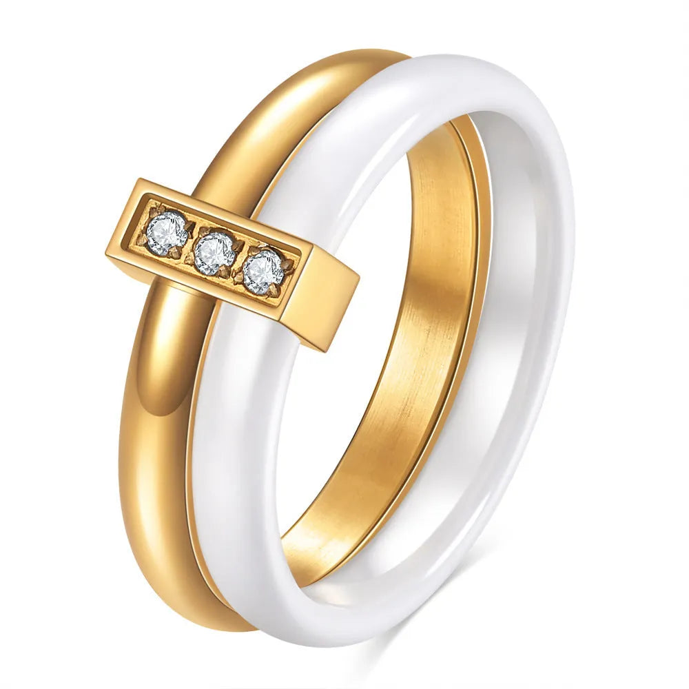 Women's ceramic ring with geometric design, glossy stitching, and zirconium inlay in steel black or gold white finish
