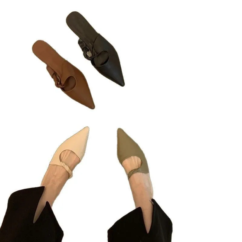 Women's soft leather-lined semi-toe box slippers in neutral colours on a rubber sole.