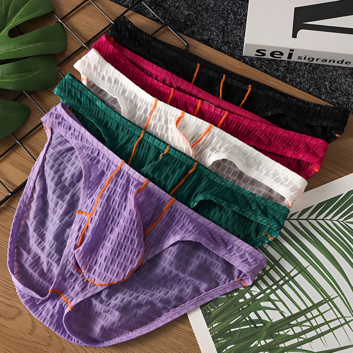 Men's low waist lace briefs in white, black, green, rose red, and light purple colours on size chart
