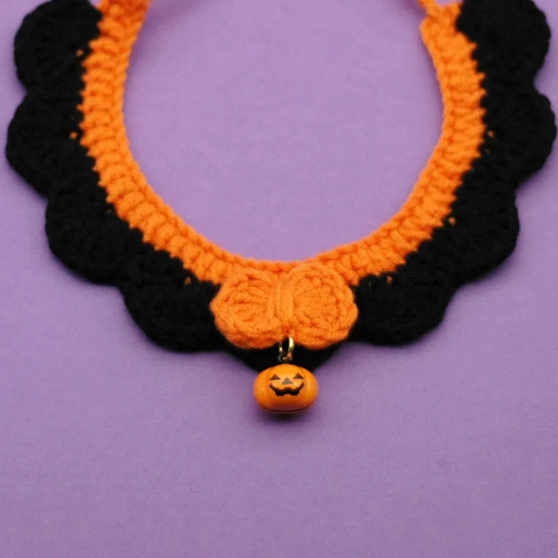 Hand-crocheted wool pet collar in pumpkin colour for a dog or cat, showing adjustable size and textured yarn.