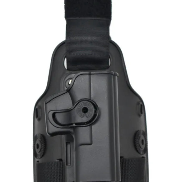 Green tactical leg holster with plastic quick-pull waist plate for attaching a hydration pack.