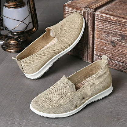 Plus size women's beige casual cloth shoes with low top, flat heel, and heart pattern.