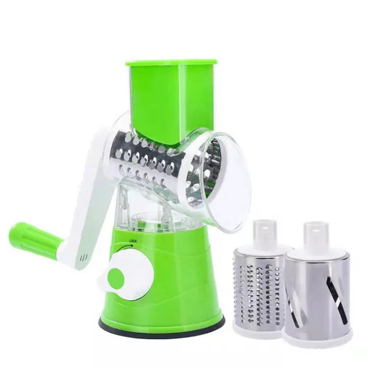 Orange multifunctional vegetable cutter kitchen tool with mandoline blades on a countertop.