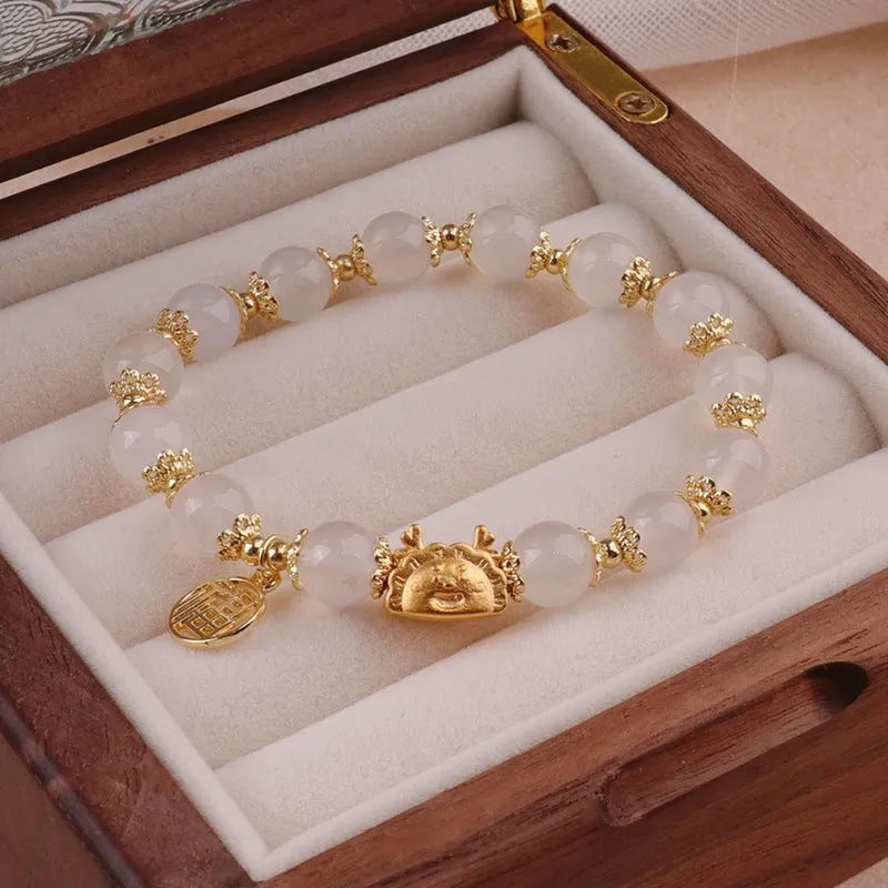 Electroplated glass coloured glaze zodiac bracelet for women showing zodiac animal modelling details