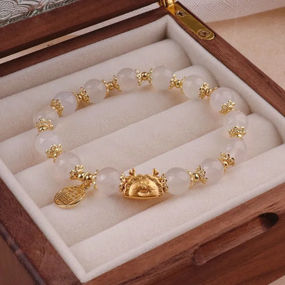 Electroplated glass coloured glaze zodiac bracelet for women showing zodiac animal modelling details