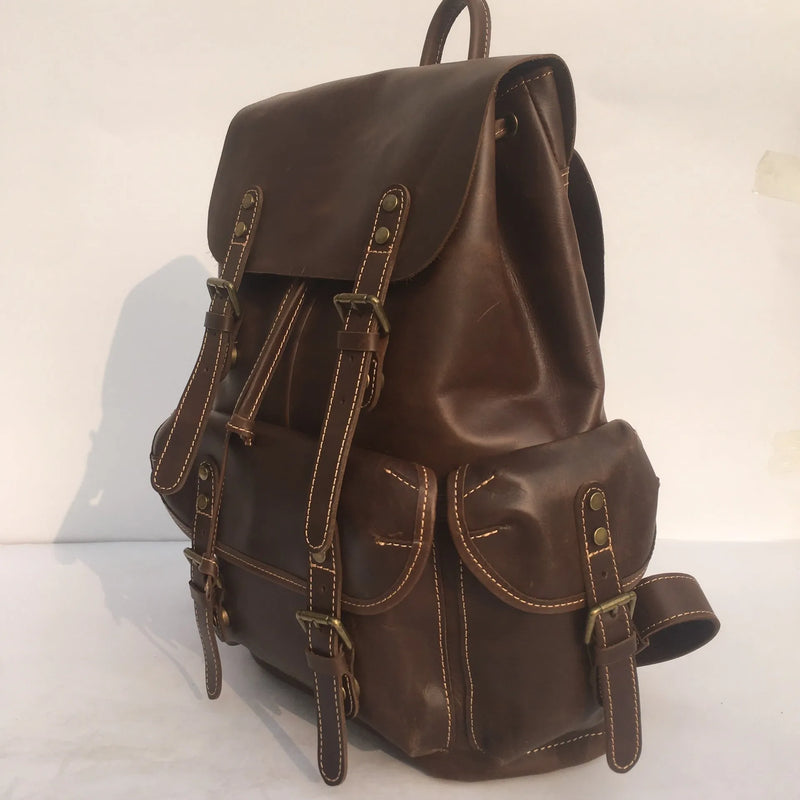 Men's back package with first layer cowhide genuine leather construction, featuring an air pillow belt bearing system for comfortable carrying, available in brown colour option.