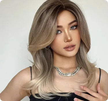 Mid-length full-head wig with platinum gradient colour, long curly hair, and bangs in star fashion style