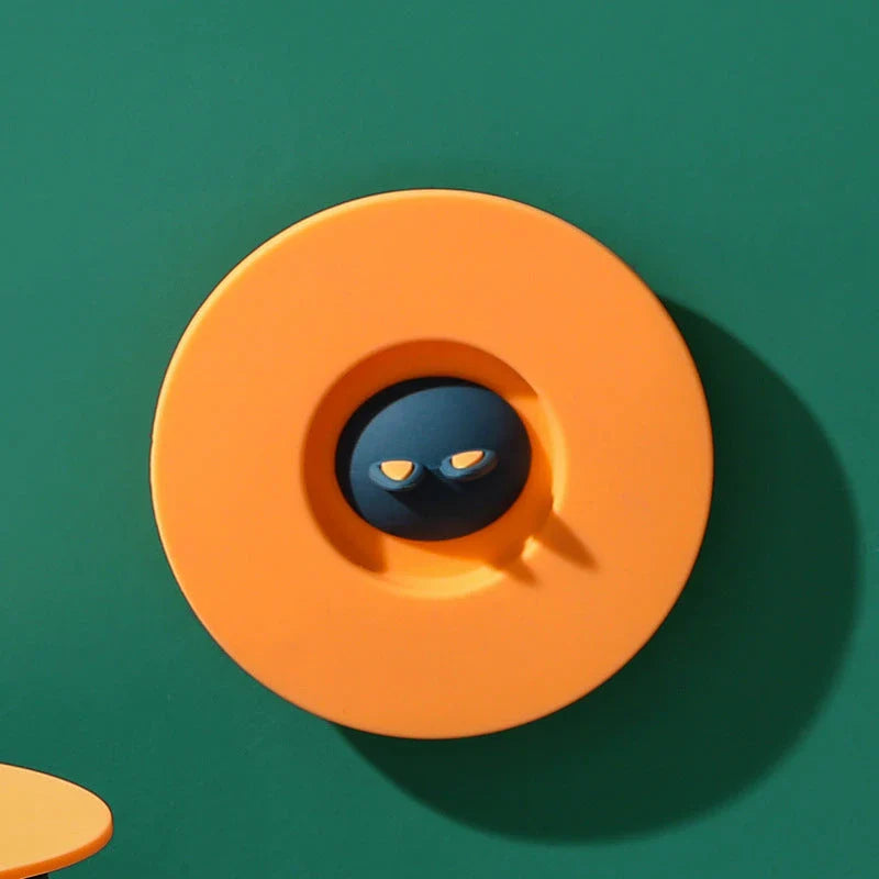 Charming cat ear silicone sealing lid in vibrant colours, designed to keep drinks fresh and prevent spills