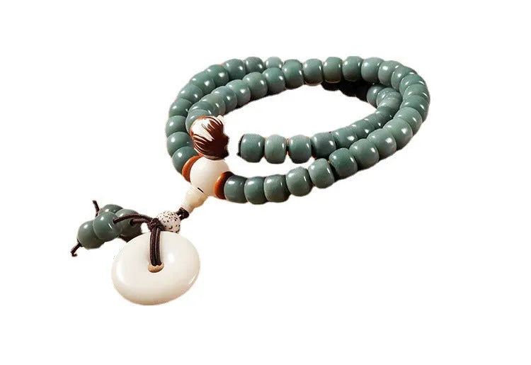 White jade and green sandalwood Bodhi seed bracelet with double ring safety buckle closure
