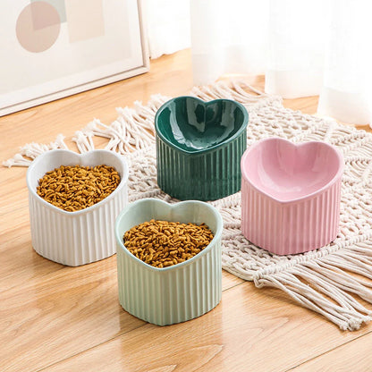 Elevated ceramic pet bowl with tilted design for comfortable and healthy feeding
