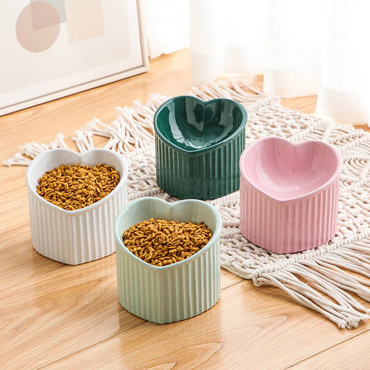 Elevated ceramic pet bowl with tilted design for comfortable and healthy feeding