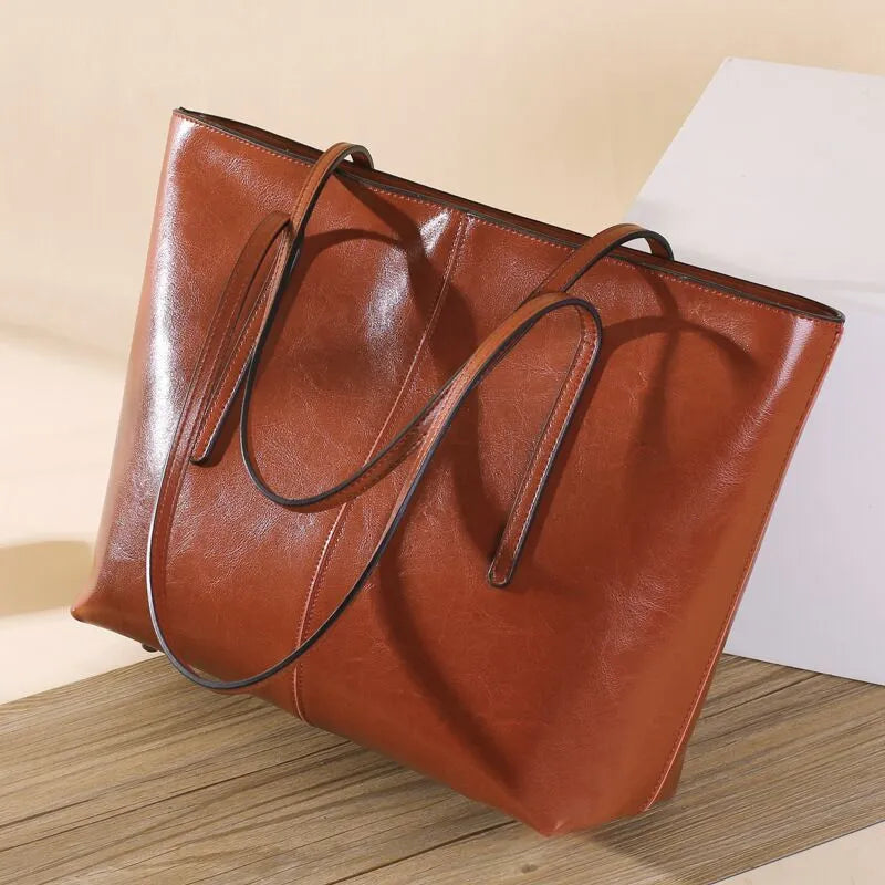 Genuine leather women's shoulder bag in retro style with multiple internal compartments and slit outer pocket