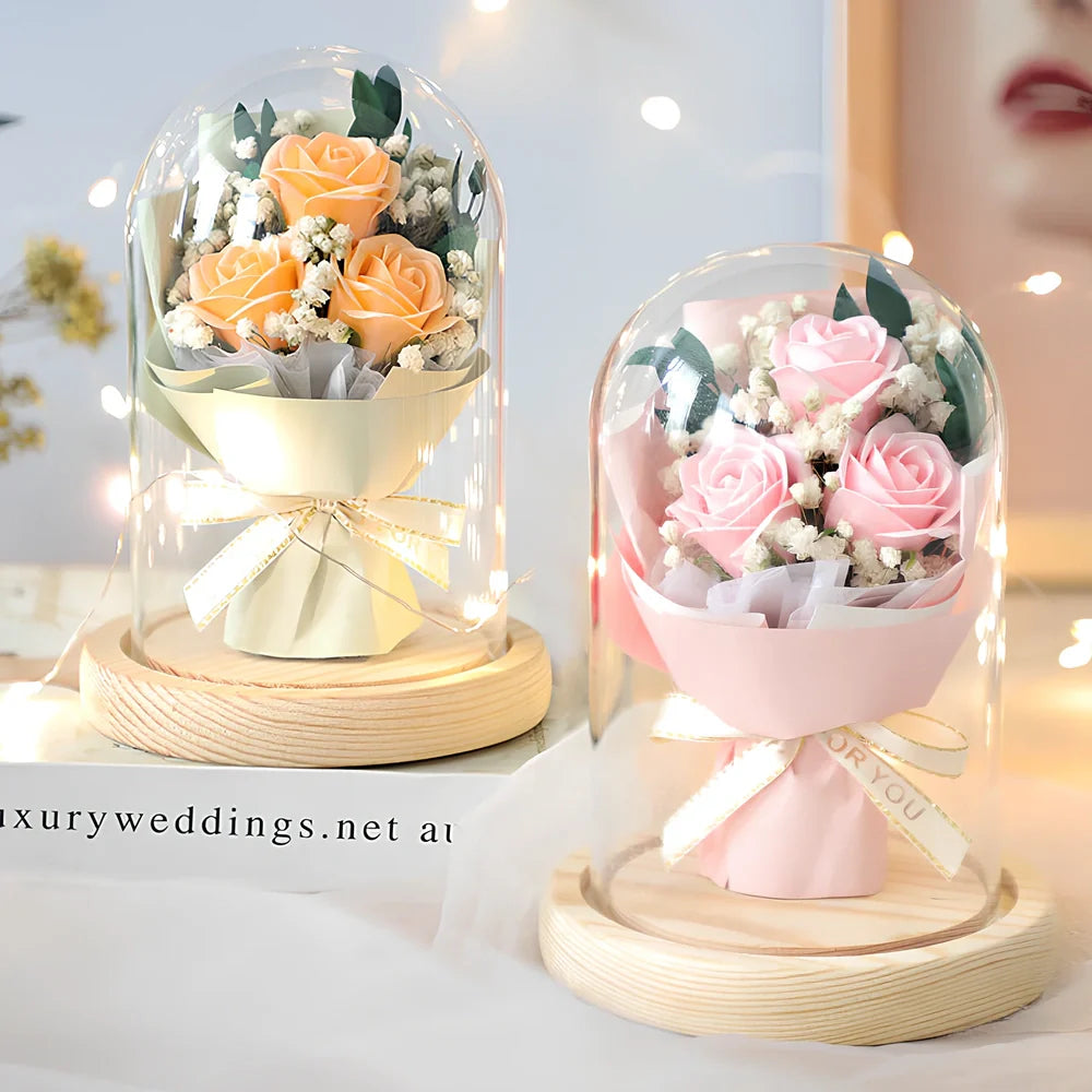 Soap flower bouquet in glass cover with red rose arrangement measuring 16cm height
