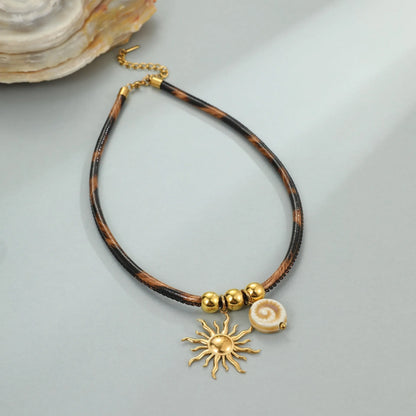 Women's stainless steel necklace with geometric leopard pendant, gold electroplated, on an adjustable chain.