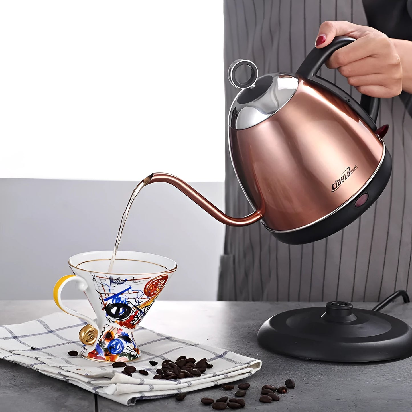 Full-automatic constant temperature mute kettle in gold colour with stainless steel construction and touch controls