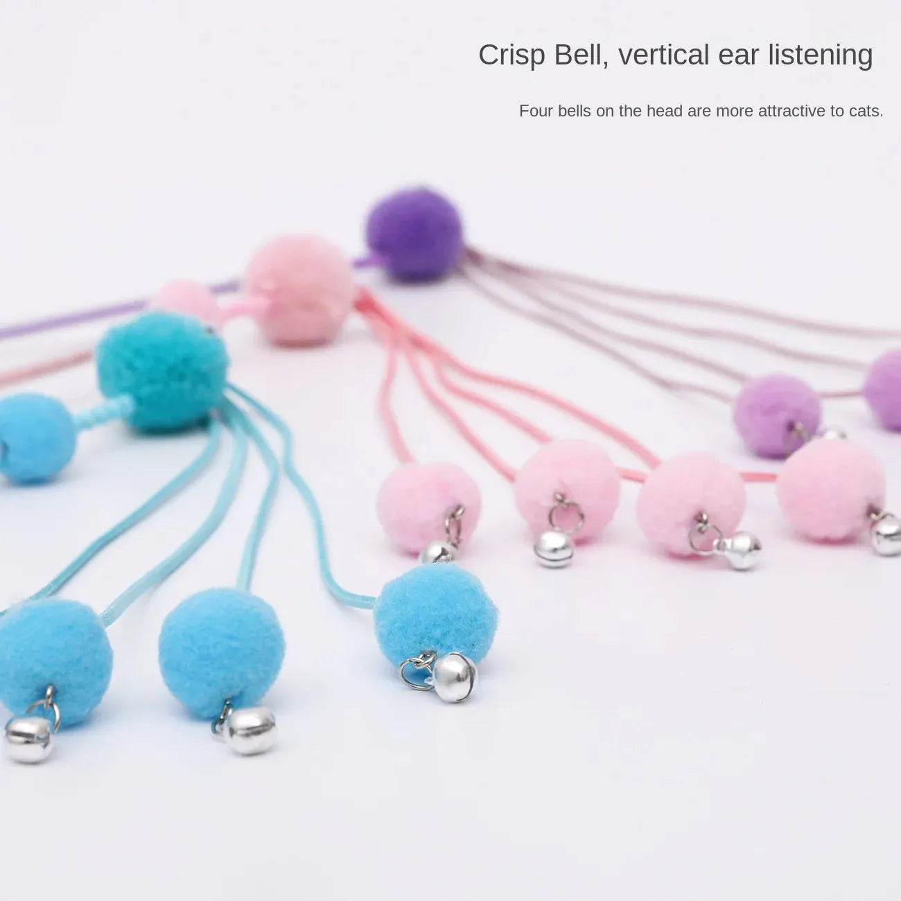 Set of four colourful cat stick toys with dangling tassels, showing blue, pink, and purple handles.