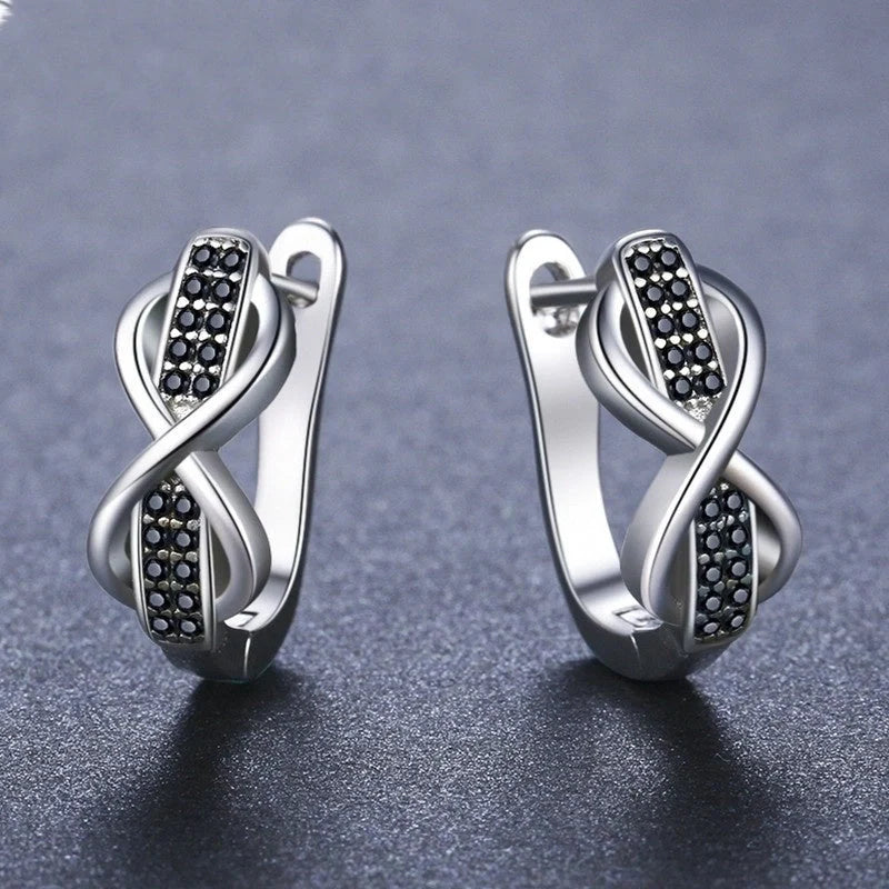 Copper earrings with round lines and micro inlaid zircon, black colour