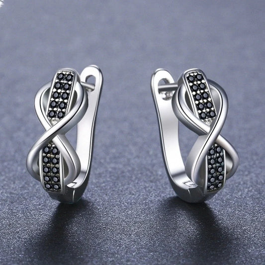 Copper earrings with round lines and micro inlaid zircon, black colour
