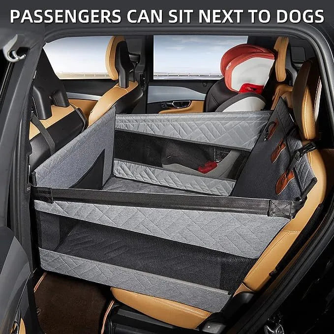 Grey water resistant rectangular dog bed with raised sides on a car back seat.