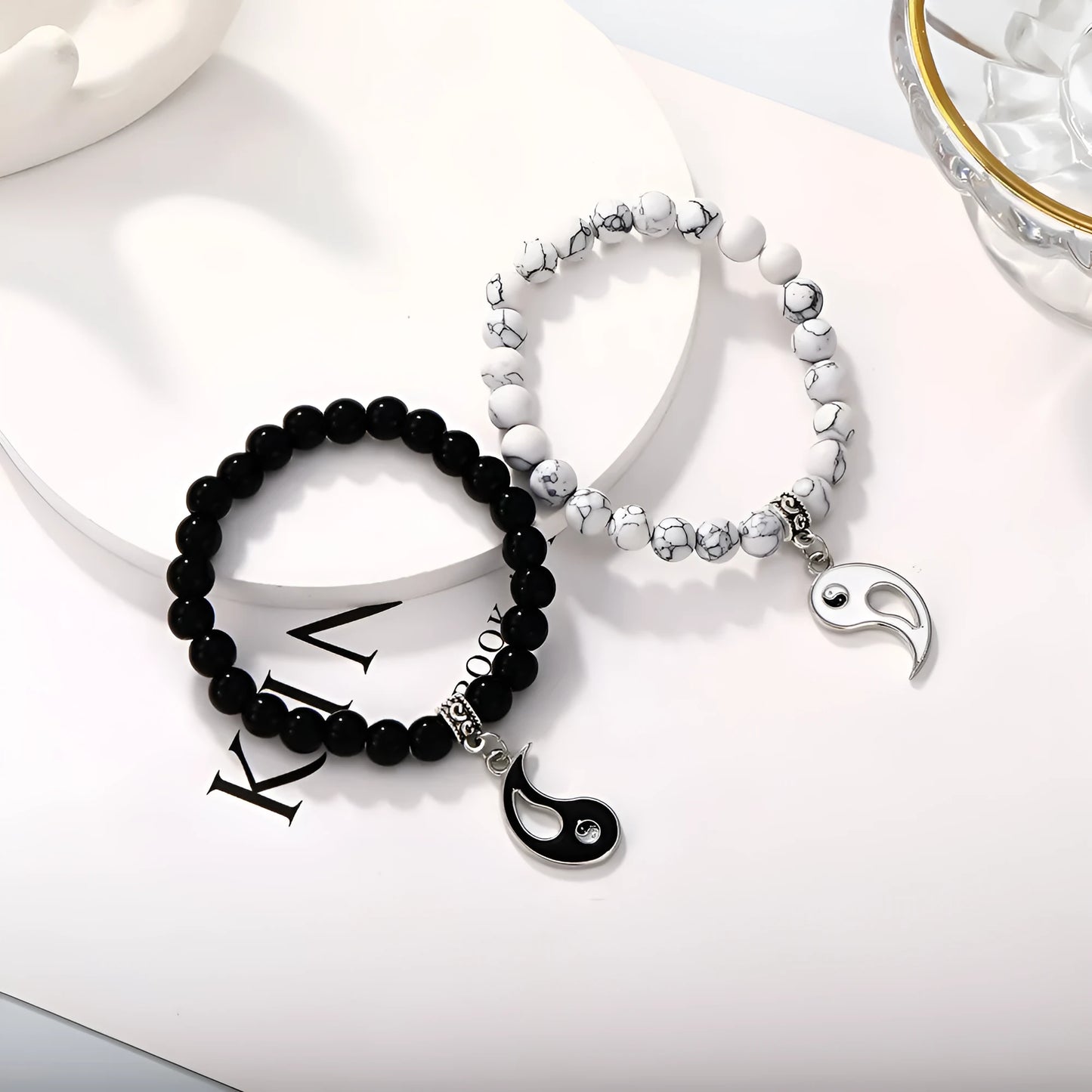 Geometric eight-diagram shaped alloy bracelet with an electroplated finish in a unisex design.