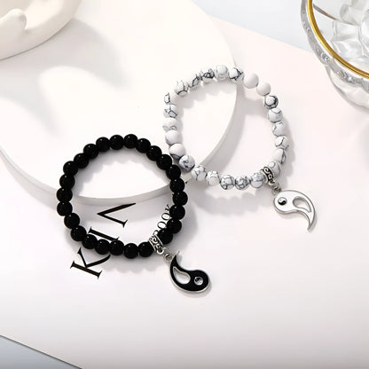 Geometric eight-diagram shaped alloy bracelet with an electroplated finish in a unisex design.