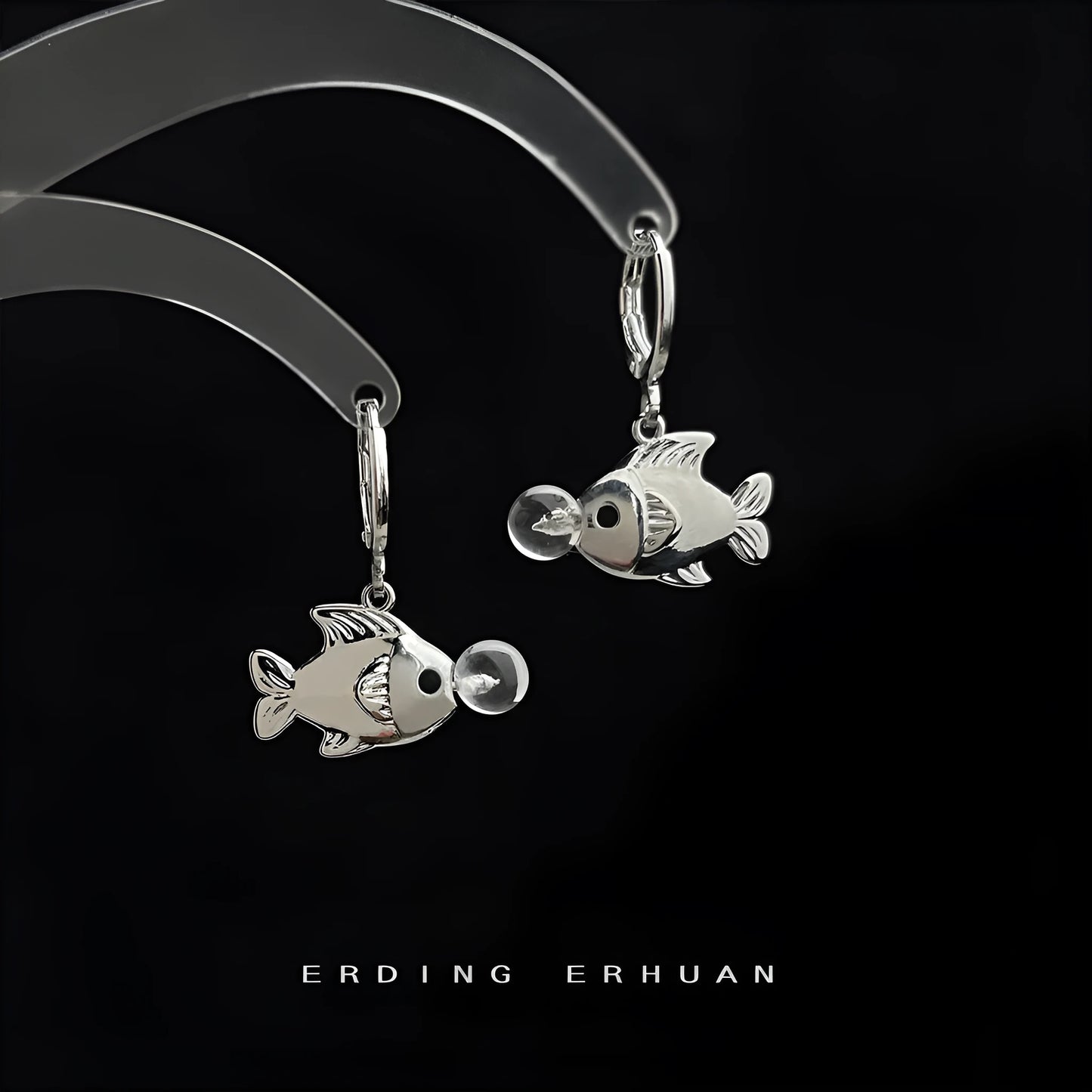 A pair of copper bubble fish earrings with electroplating, showing animal design in a sweet cool style.