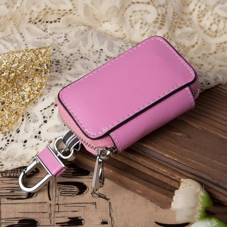 White genuine leather square car key case with plain weave pattern, shown with key bag