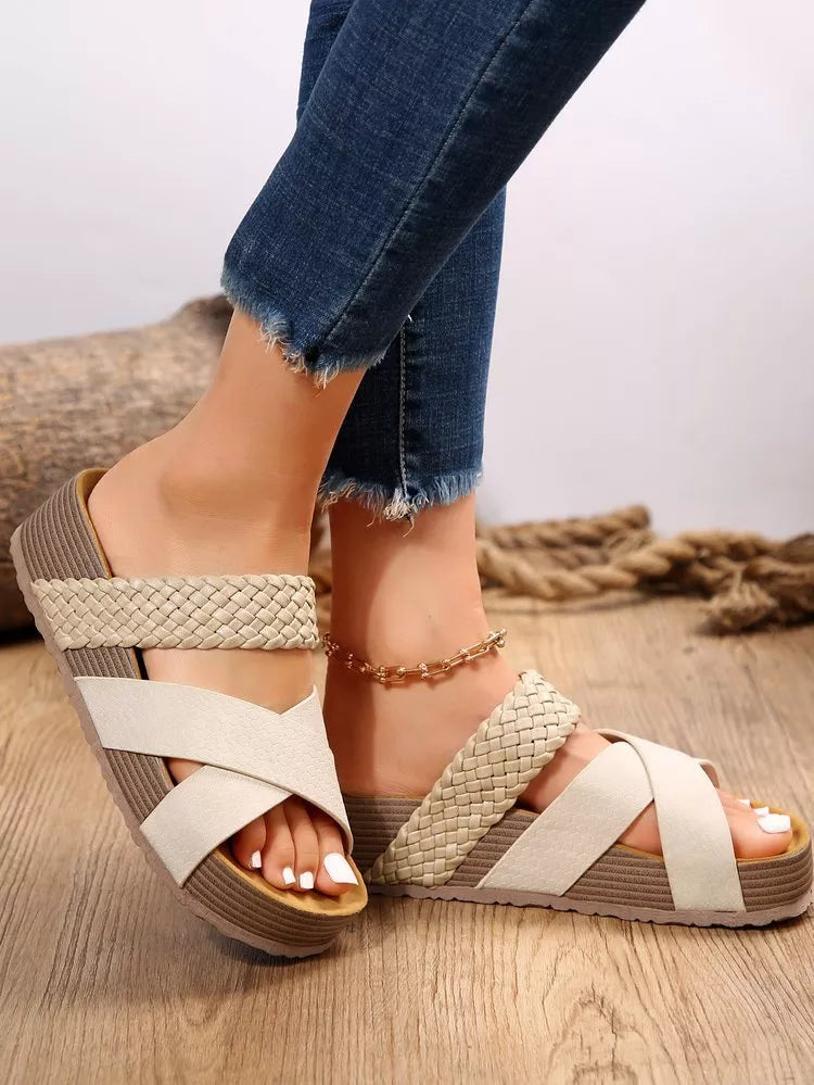Women's woven cross-strap slippers in various colours, perfect for summer beach outings