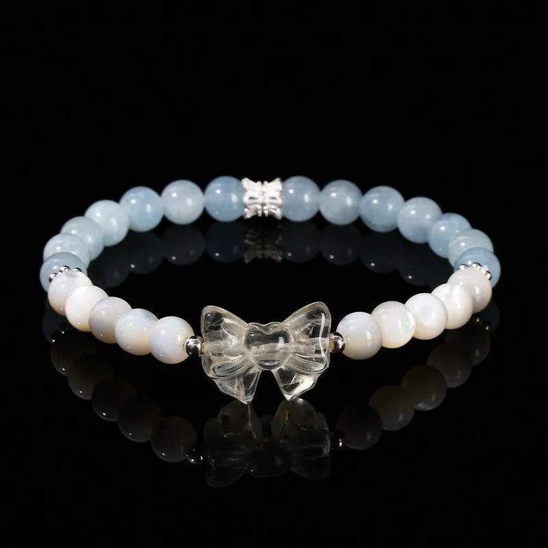 Women's geometric cat head bracelet with pink crystal beads and copper setting