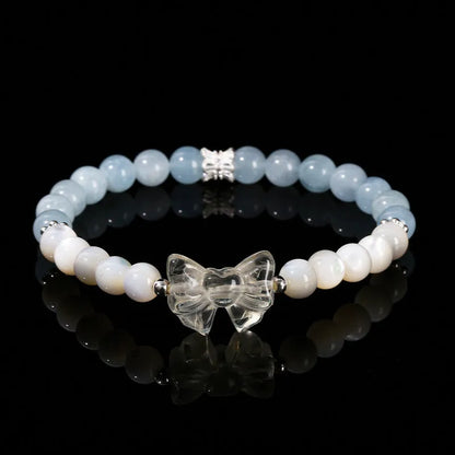 Women's geometric cat head bracelet with pink crystal beads and copper setting