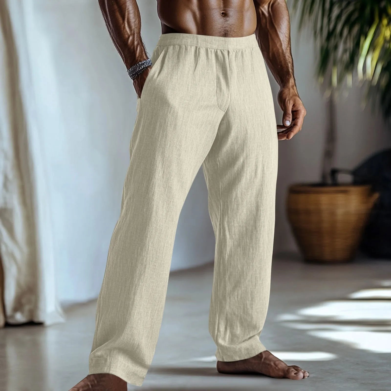 Straight leg cotton linen trousers in light green, shown with side pockets and a casual fit.