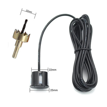 Wireless reversing sensor system showing main display unit, four embedded probes, and installation accessories.