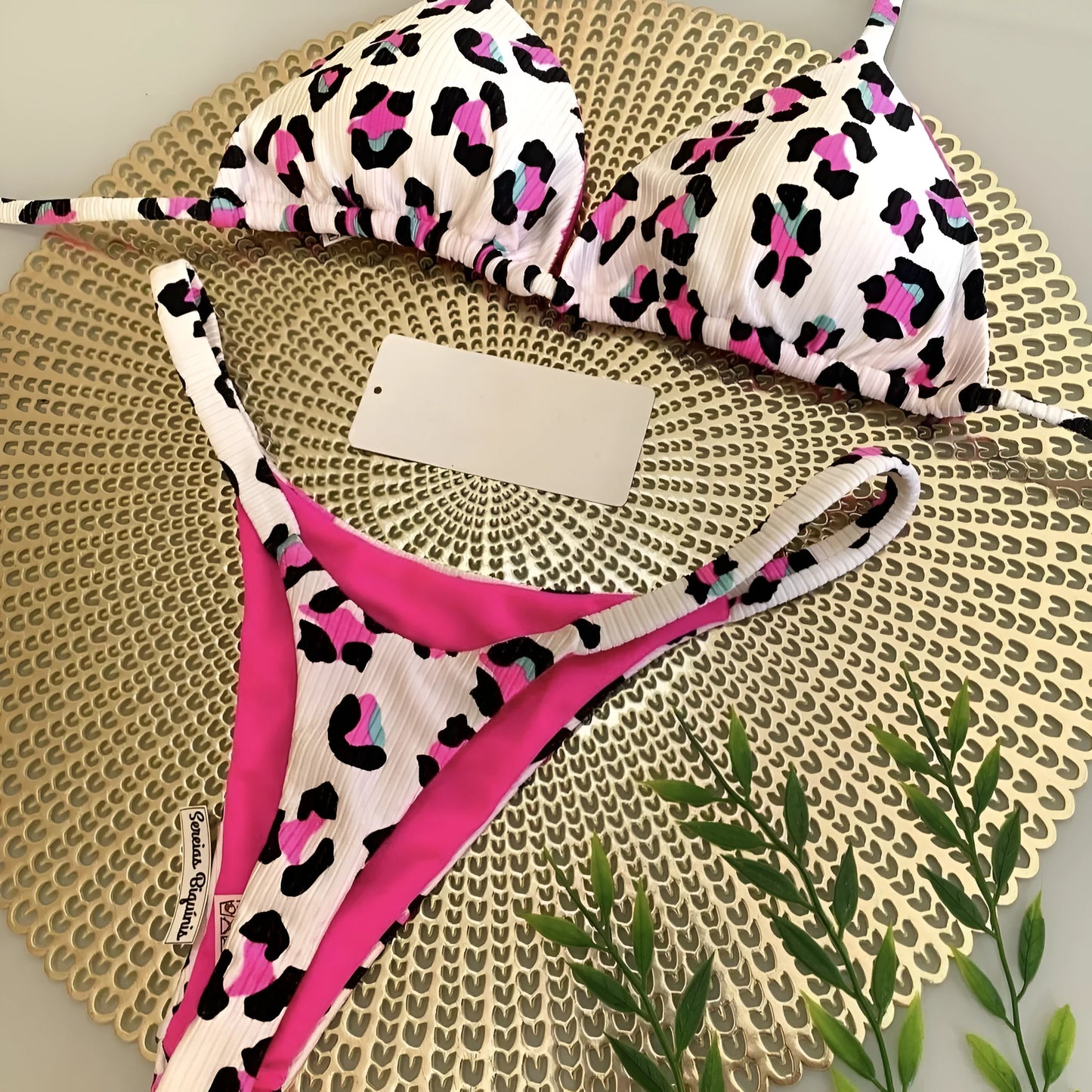 Women's printed two-piece bikini swimsuit with quick-dry fabric and cotton lining.