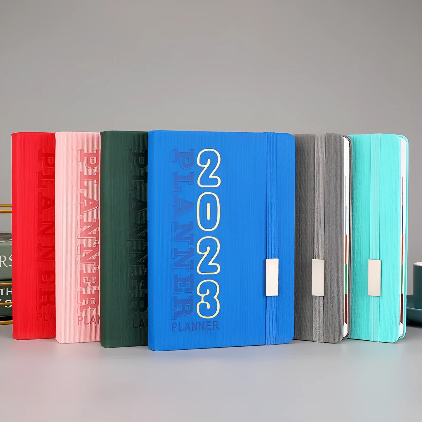 Creative student almanac calendar with imitation leather cover open to show weekly layout