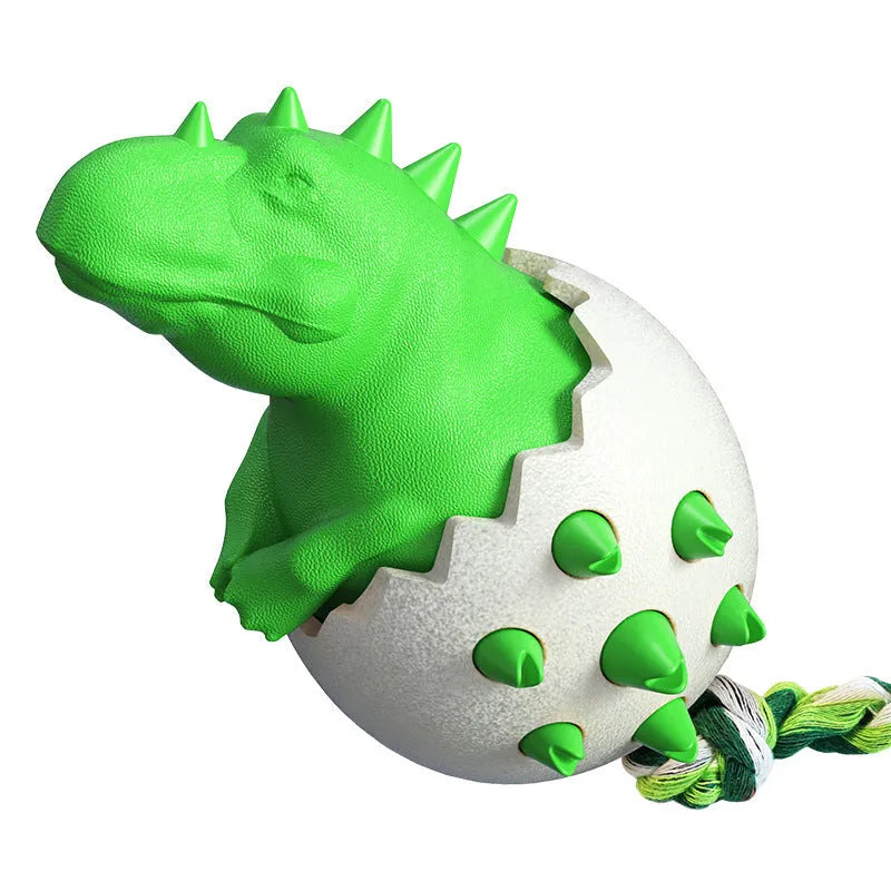 Blue dinosaur-shaped dog chew toy with rope attached, showing textured surface with nubs and grooves