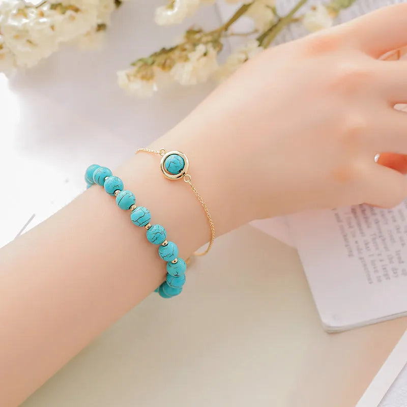 Double-layer women's bracelet with lucky beads and colourful crystals in gold-toned setting