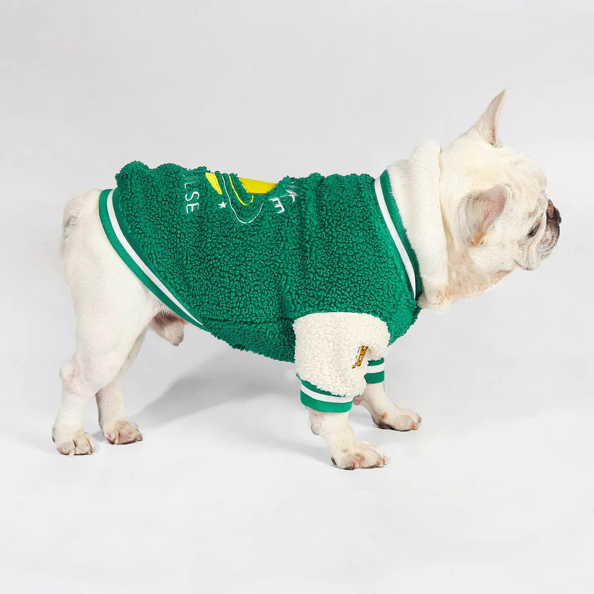 Green fleece-lined winter dog coat for medium to extra large breeds on mannequin