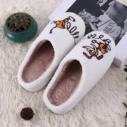 White fluffy cartoon-pattern slippers with a rubber sole and artificial wool lining.