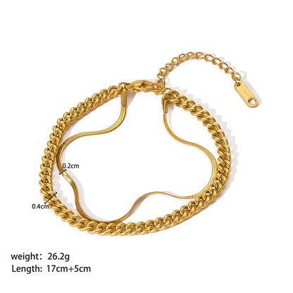 Elegant stainless steel bracelet with a sleek geometric design, gold-plated finish, and unisex style suitable for any occasion.