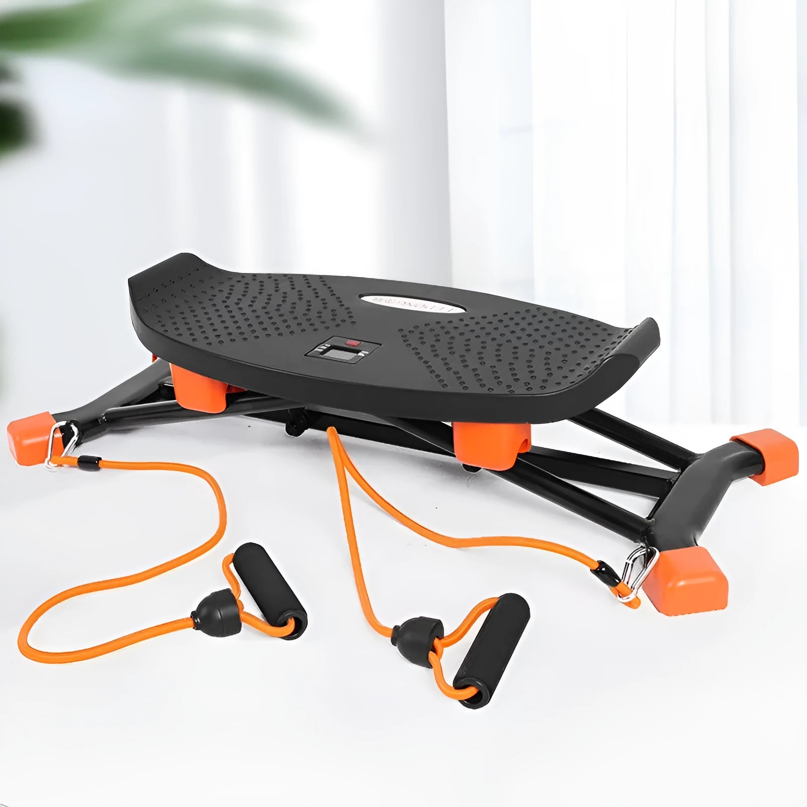 Black JS101A mini indoor skiing exercise machine with elastic hand straps on a carpet.